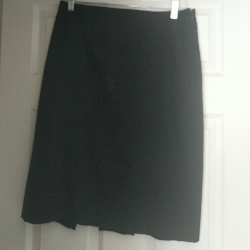 Black suit skirt, like new, size 4.